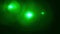 Realistic green flash light Lens flare on black background.