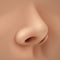 Realistic human nose on skin color background