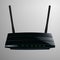 Realistic illustration of a black router in a sleek modern design