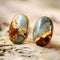 Realistic Landscape Earrings: Brown, Turquoise, And Gold Studs With Soft Edges