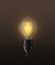 Realistic lightbulb. Electricity design light lamp bright yellow glowing on black dark background isolated vector