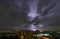 Realistic lightning in Downtown Bangkok city at night background, Thailand. Electricity. Natural light effect, bright glowing