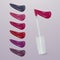 Realistic lipstick with collection of strokes of lipsticks various colors isolated on light background, vector, eps 10