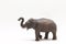 Realistic miniature elephant figure isolated on a white background