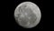 Realistic moon in the outer space isolated on black background, 3d rendering