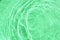 Realistic natural water wave overlay for background, blurred transparent green colored water surface texture