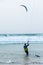 Realistic outdoor photo of kiteboarding