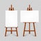 Realistic paint desk with blank white canvas. Wooden easel and a sheet of drawing paper. Presentation board on a tripod