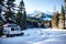 Realistic photo landscape of winter snow forest and camper