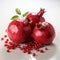 Realistic Rendering Of Two Pomegranates On White Background