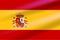 Realistic Spanish Flag developing in the wind with coat of arms with crowns, a lion and a castle on the background of a shield.