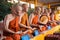 Realistic statue of a full-length Buddhist monk in a Thailand temple