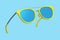 Realistic sunglasess with gradient lens and blue plastic frame on blue