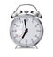 Realistic vector glossy metal alarm clock on a white background