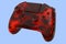 Realistic video game joystick with lava pattern on blue background