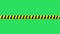 Realistic yellow and black ribbon on green background.