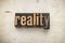 Reality word in wood type