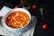 Ð¡ream soup of tomatoes and pepper. Hot tomato soup in bowl