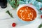 Ð¡ream soup of tomatoes and pepper. Hot tomato soup in bowl