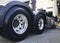 Rear of a Big Semi Truck Wheels Tires. Rubber. New Tyres with Chrome Wheels