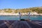 The rear deck of a sailing yacht, over the gorgeous waters of Arki island, Greece