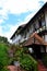 Rear exit doorway to garden and seating area of colonial bungalow Ye Olde Smokehouse Hotel Cameron Highlands Malaysia