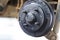 A rear hub of the car after removing a tire and wheel, maintaining a brake and wheel system, car jack-up for change a car wheel,