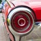 The rear lamp of an old vintage retro car. Close-up. Motor transport.