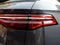Rear LED headlamp of a modern car. Brake taillight. Red stop lighting of highway vehicles. Cars ambient lighting. Cars taillight
