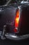 Rear red lights and metal chrome parts with bumper of business car Mitsuoka Galue