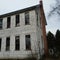 Rear side view old church school house in Enterprise PA