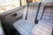 Rear textile seats wit armrest in an old retro car