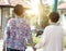 Rear view Asian elderly women walking at outdoor park