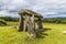 A rear view of a balanced rock roof at the ancient burial chamber at Pentre Ifan in the Preseli hills in Pembrokeshire, Wales