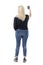 Rear view of blond hair middle age woman taking photo memories with smart phone