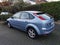 Rear view of a blue Ford Focus MK2 car from 2005 parked in the street