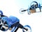 Rear view of blue VTOL drones carrying delivery packages flying in the sky