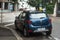 Rear view of blur Dacia Sandero crossover parked in the street