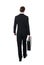 Rear view of businessman carrying briefcase