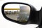 Rear view car driving mirror overtaking big truck