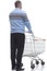 Rear view. casual man with shopping cart reading an ad on a white screen
