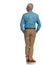 Rear view of casual old man with blue denim shirt and chino pants