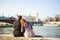 Rear view. couple of lovers on Seine river in Paris. travel in spring in Europe