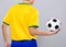 Rear view of football player hold with soccer ball