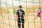 Rear view of futsal goalkeeper