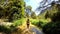 Rear view of girl walking down the stream of river in nature at Sierra de Cazorla national park.