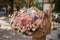 Rear view of girl who holds huge bouquet of different flowers