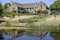 Rear view of Great Chalfield Manor Reflected in Lake