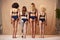 Rear View Of Group Of Diverse Body Positive Women Friends One With Prosthetic Limb In Underwear