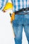 Rear view of handyman wearing tool belt